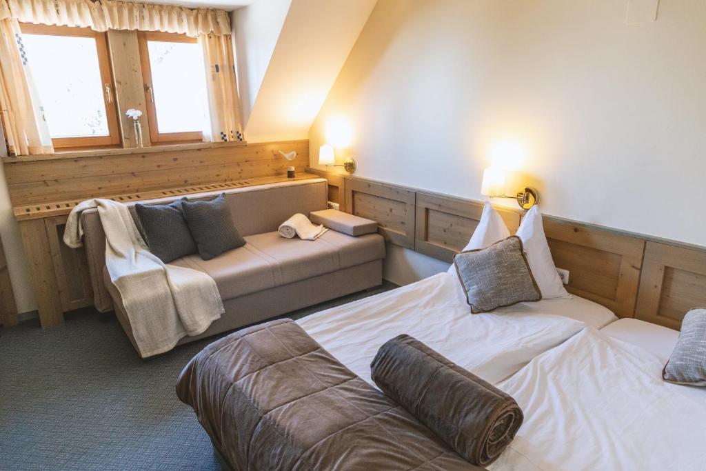 Postelja oz. postelje v sobi nastanitve Hotel Krvavec