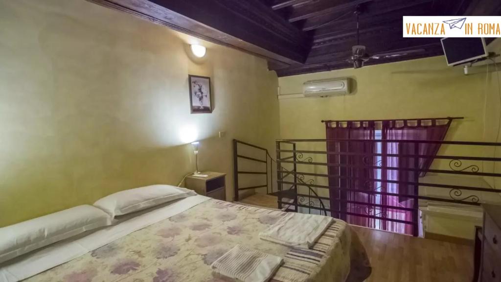 ローマにあるアル パンテオン コン トーマス マンのベッドルーム1室(ベッド1台付)