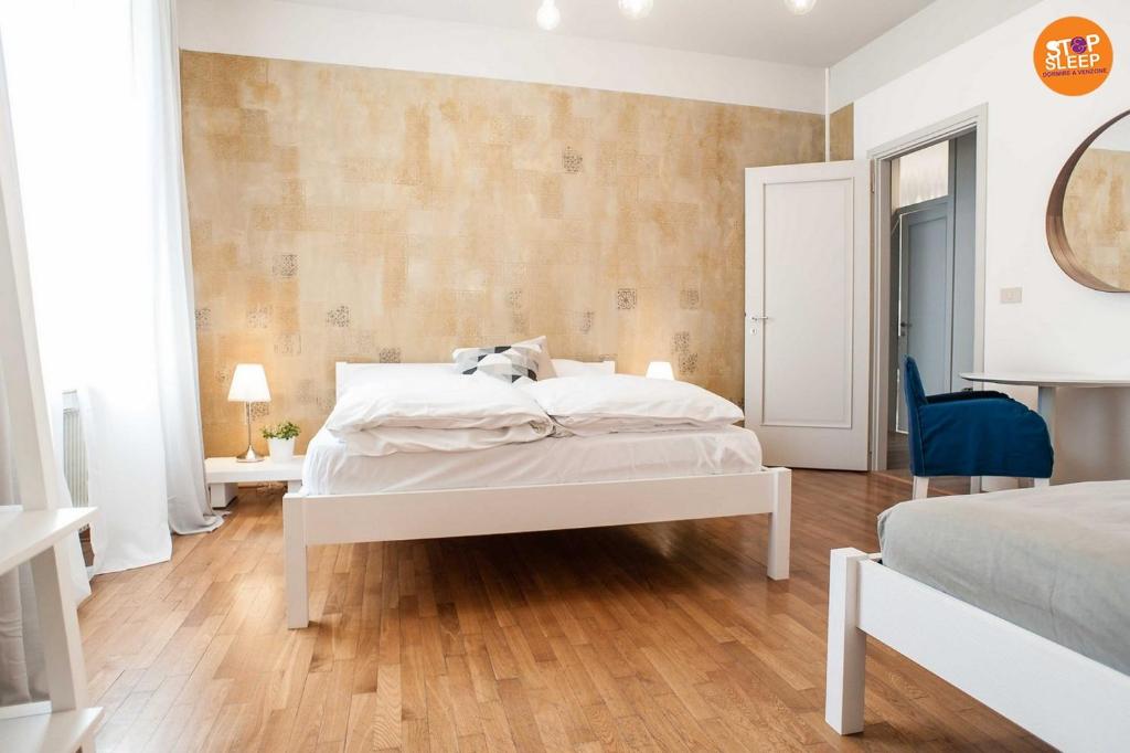 Posteľ alebo postele v izbe v ubytovaní Stop & Sleep Venzone