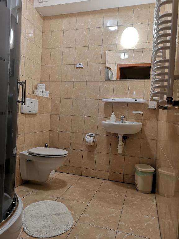 Koupelna v ubytování Hotel Duka