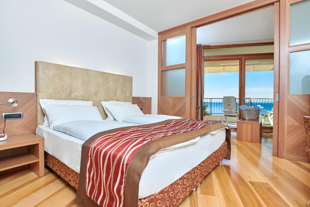 Postel nebo postele na pokoji v ubytování Hotel Baia Verde