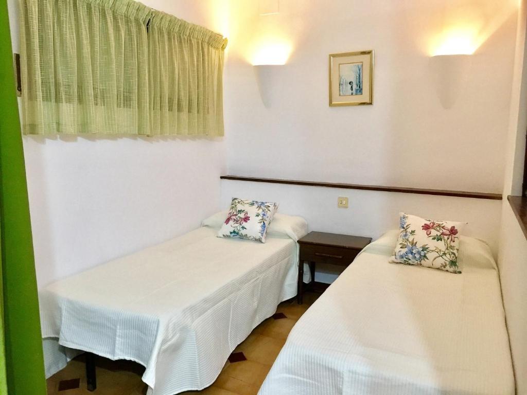 Posteľ alebo postele v izbe v ubytovaní JARDINS DEL MAR 46