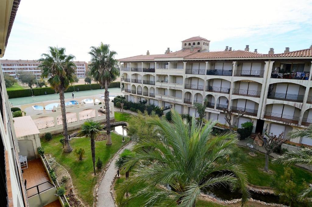 Bazén v ubytování JARDINS DEL MAR 58 nebo v jeho okolí