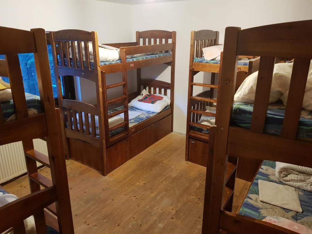 Postel nebo postele na pokoji v ubytování Good Bye Lenin Hostel Zakopane