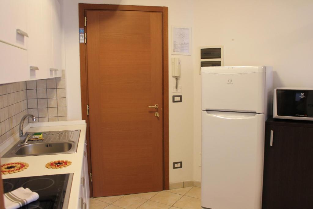 Kuchyň nebo kuchyňský kout v ubytování Tropicana Residence