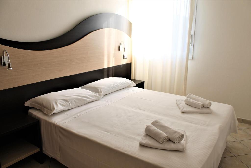 Postel nebo postele na pokoji v ubytování Tropicana Residence