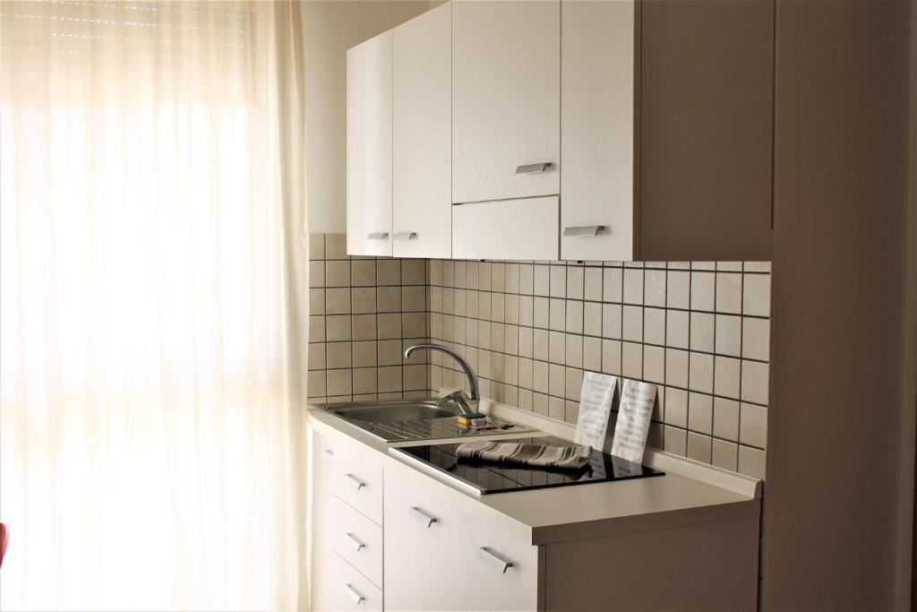 Kuchyň nebo kuchyňský kout v ubytování Tropicana Residence