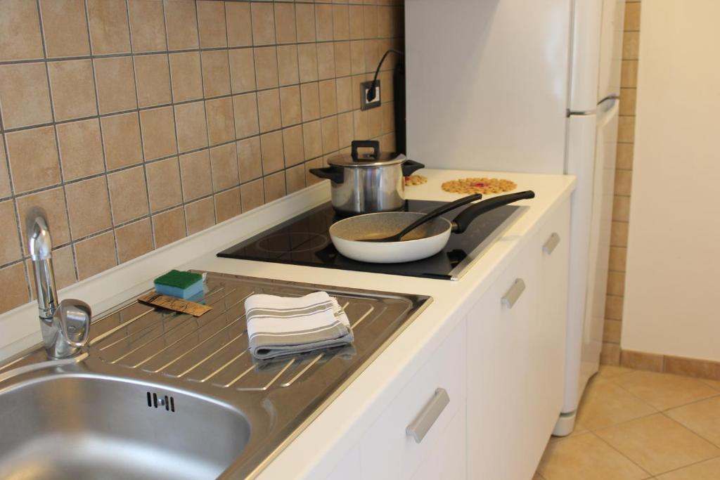 Kuchyň nebo kuchyňský kout v ubytování Tropicana Residence