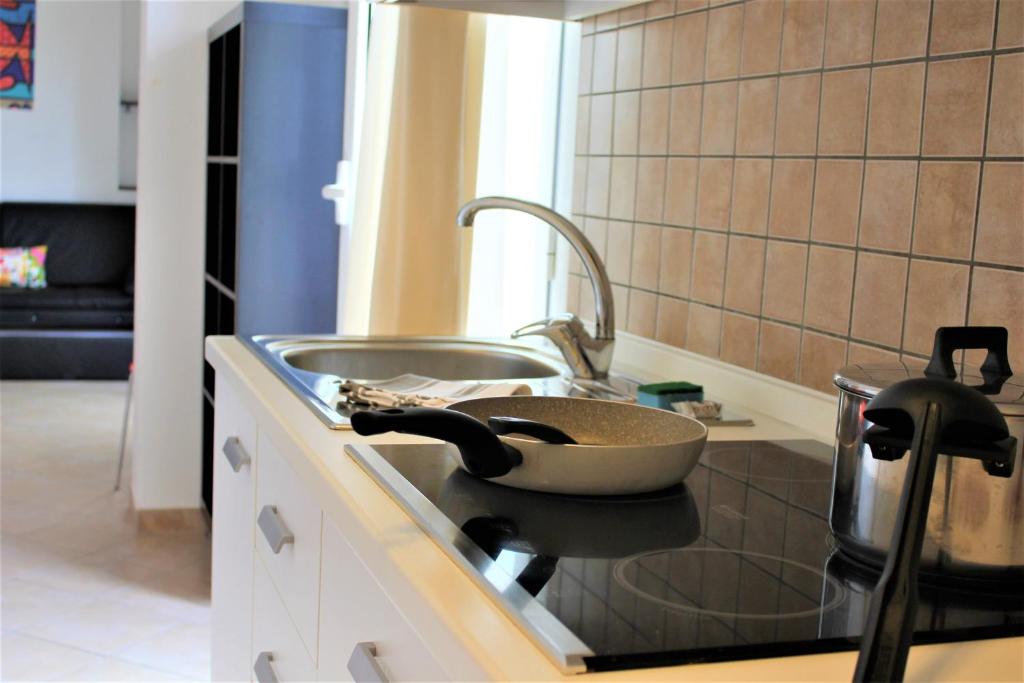 Kuchyň nebo kuchyňský kout v ubytování Tropicana Residence
