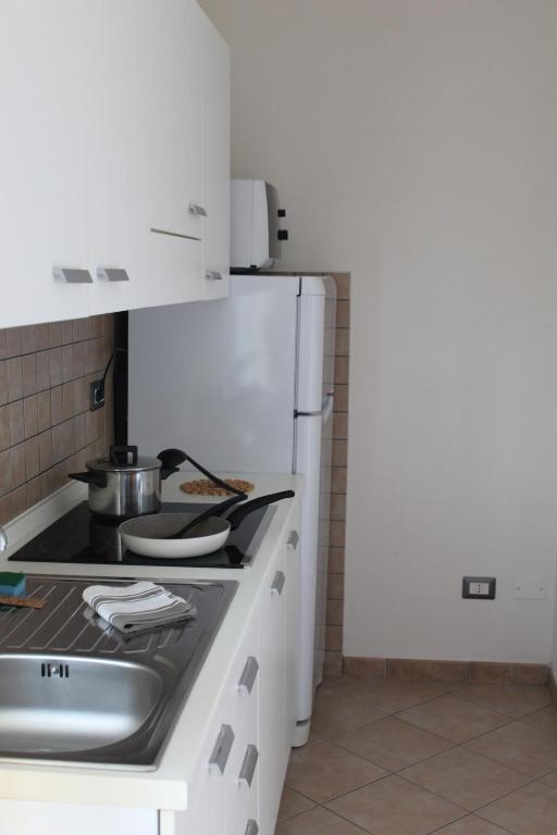 Kuchyň nebo kuchyňský kout v ubytování Tropicana Residence
