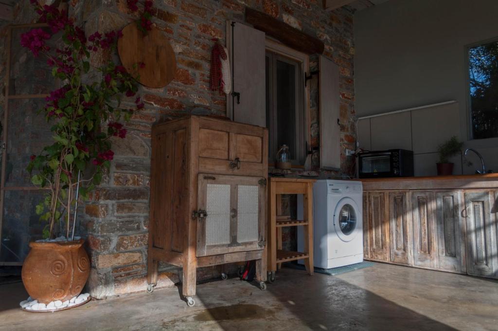 Kuchyň nebo kuchyňský kout v ubytování Sinanis Garden House
