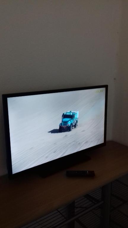 TV a/nebo společenská místnost v ubytování Hostel Pension Tivoli
