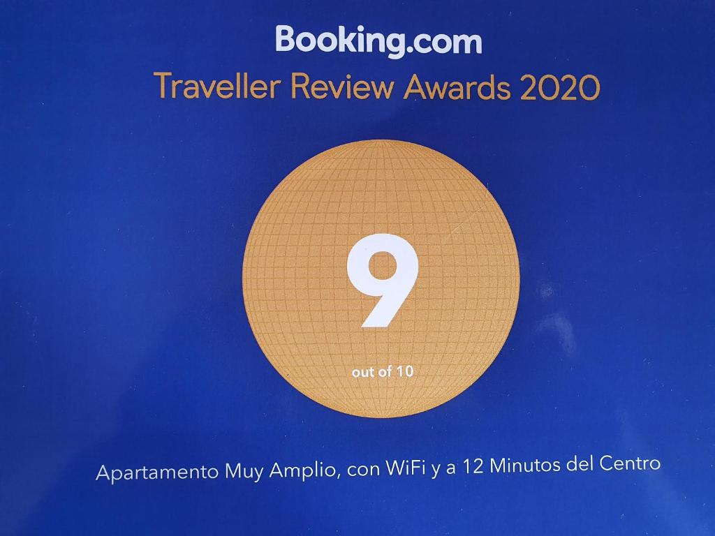 a flyer for a travel review awards with the number nine at Apartamento Muy Amplio, con WiFi y a 12 Minutos del Centro in Gijón