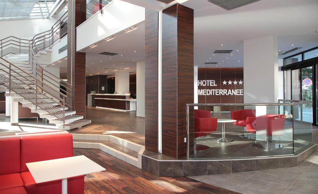 Posezení v ubytování Hôtel Le Méditerranée