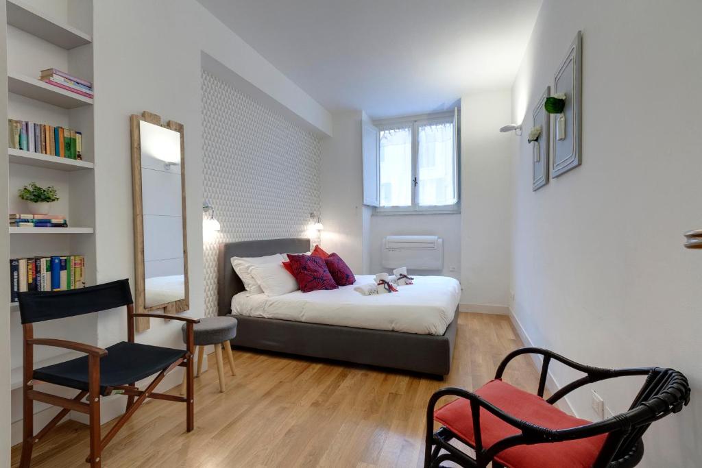 Łóżko lub łóżka w pokoju w obiekcie Costa San Giorgio Apartment by Mamo Florence