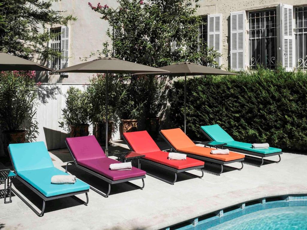 Bazén v ubytování Jules César Hotel & Spa Arles - MGallery Collection nebo v jeho okolí