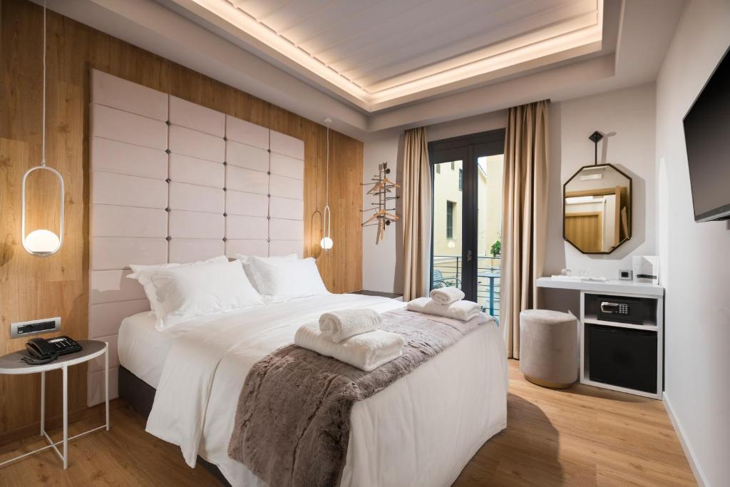 Carpe Diem Boutique Hotel 객실 침대