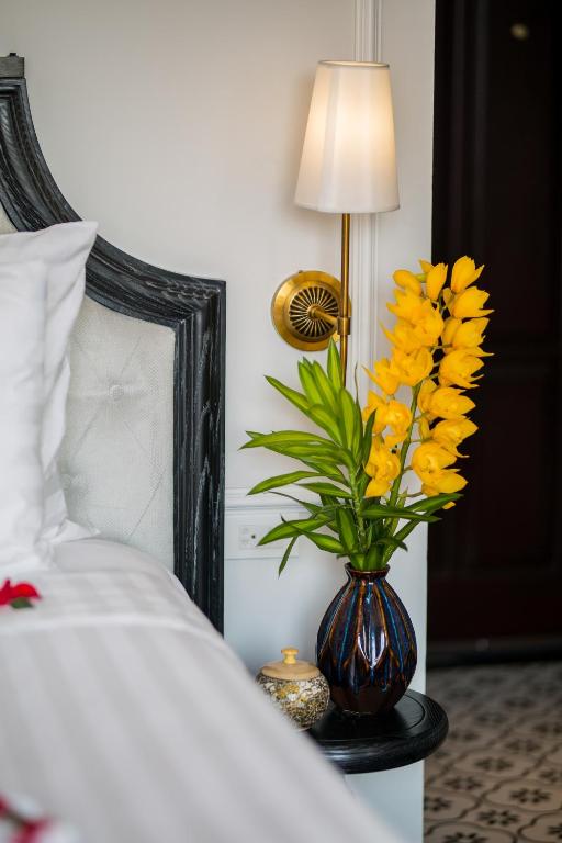 Postel nebo postele na pokoji v ubytování Hanoi Media Hotel & Spa