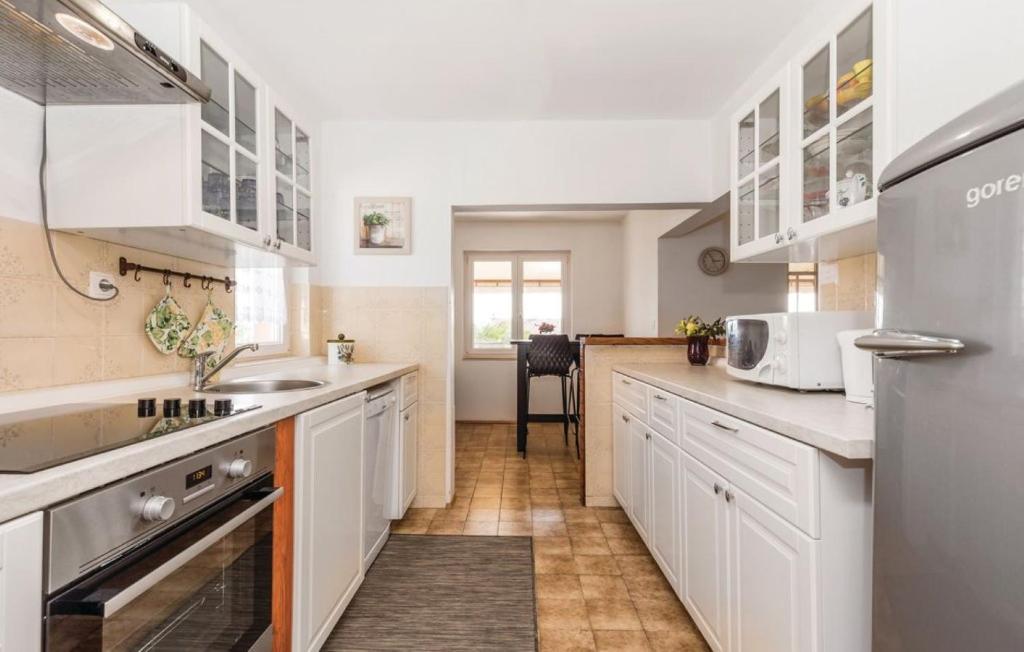 Kuchyň nebo kuchyňský kout v ubytování Casa Fiorella Ika-Opatija