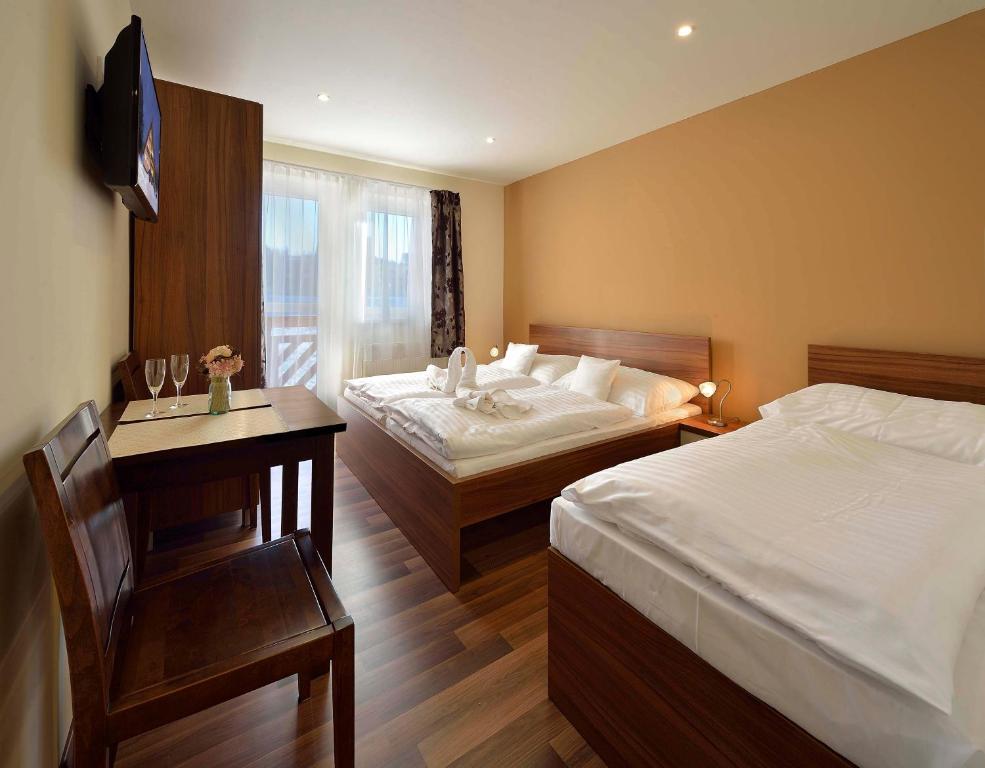 Postel nebo postele na pokoji v ubytování Villa Gloria Rooms & Apartments