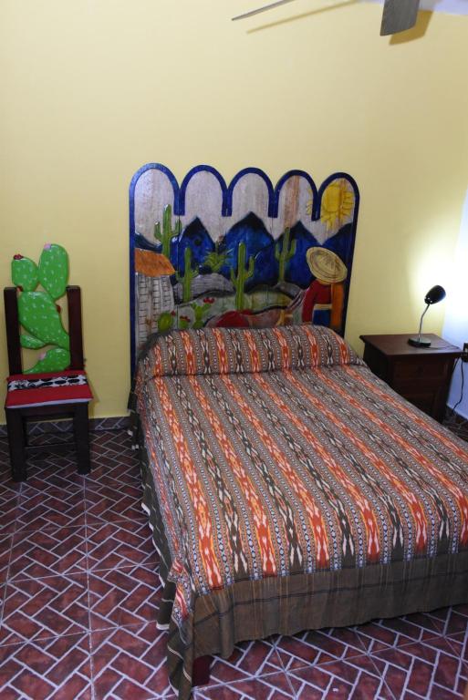Postel nebo postele na pokoji v ubytování CANCUN GUEST HOUSE