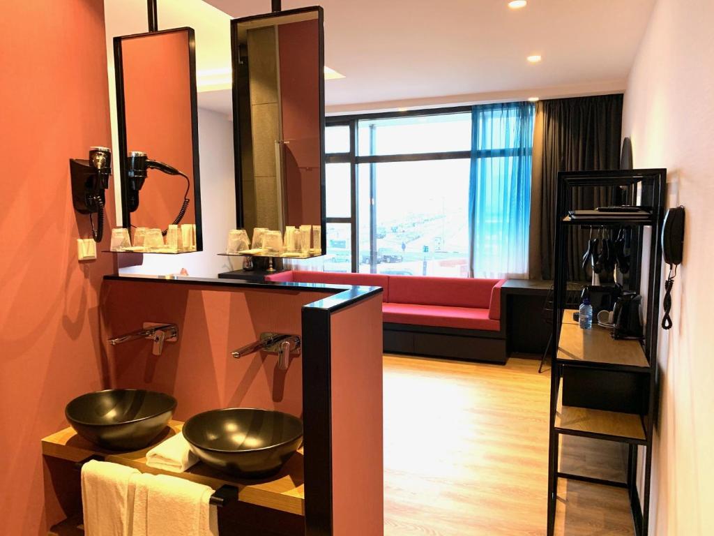 TV a/nebo společenská místnost v ubytování Palace Hotel Zandvoort