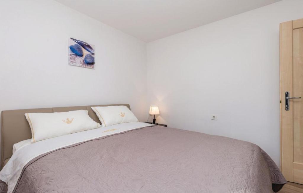 Postel nebo postele na pokoji v ubytování Casa Fiorella Ika-Opatija