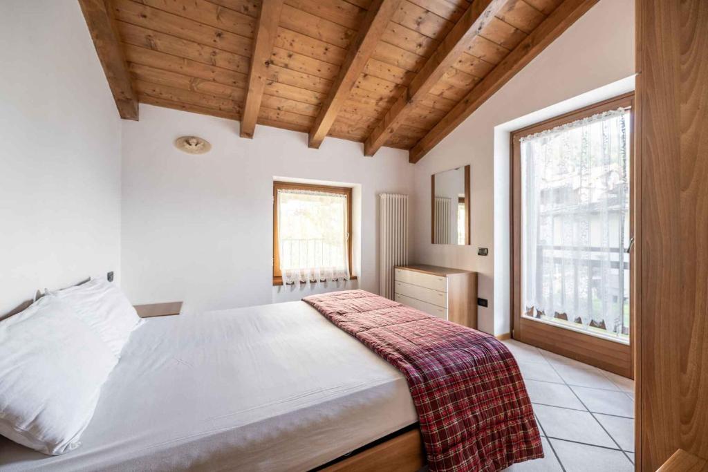 Posteľ alebo postele v izbe v ubytovaní Residence Arnica