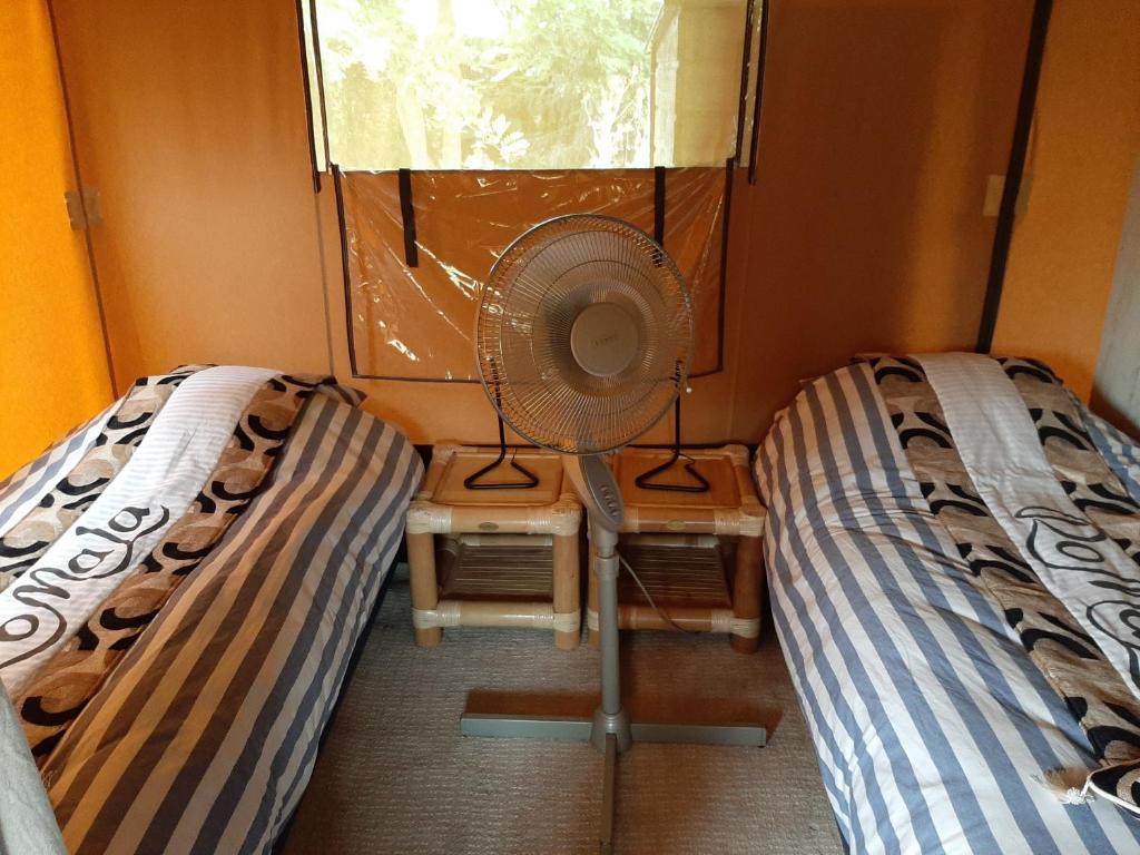 Postel nebo postele na pokoji v ubytování Glamping tent Romala