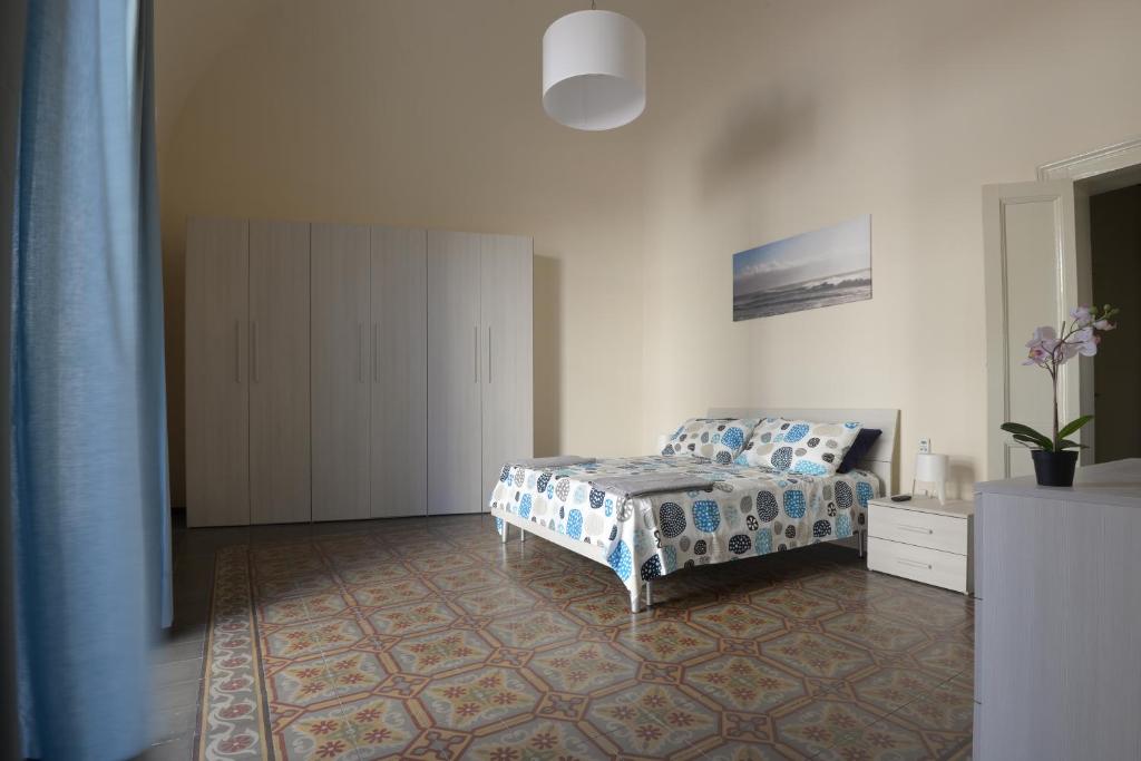Posteľ alebo postele v izbe v ubytovaní A casa di zio Ciccio