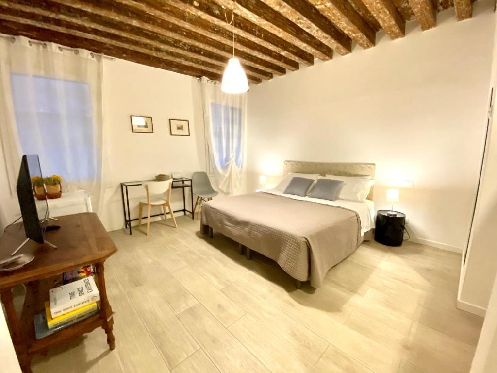 Posteľ alebo postele v izbe v ubytovaní Santa Caterina