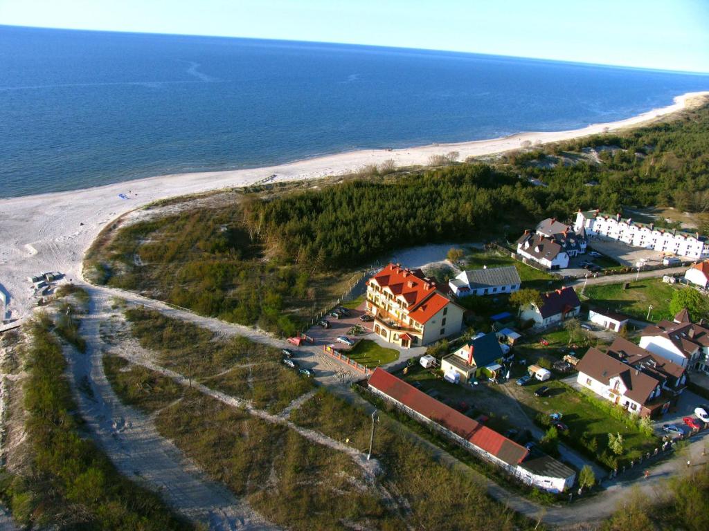 an aerial view of a house next to the beach at Villa Ibiza in Rowy