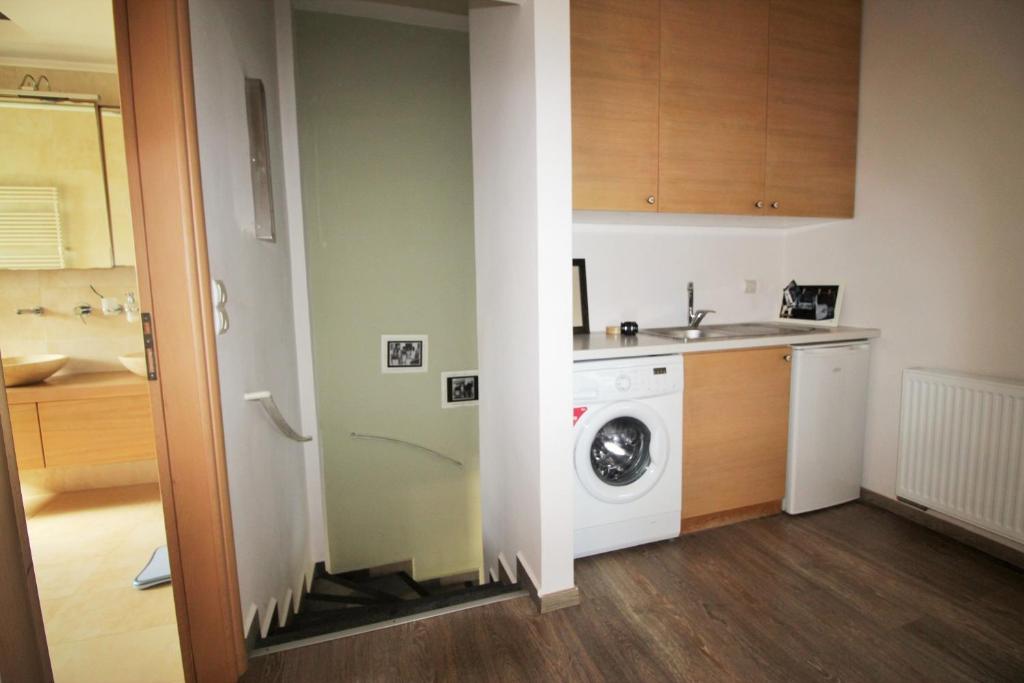 Kuchyň nebo kuchyňský kout v ubytování Amoutsa Seaside Villa