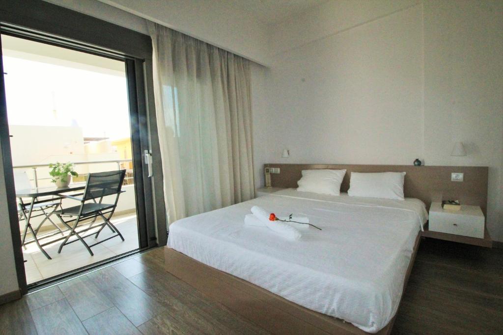 Postel nebo postele na pokoji v ubytování Amoutsa Seaside Villa