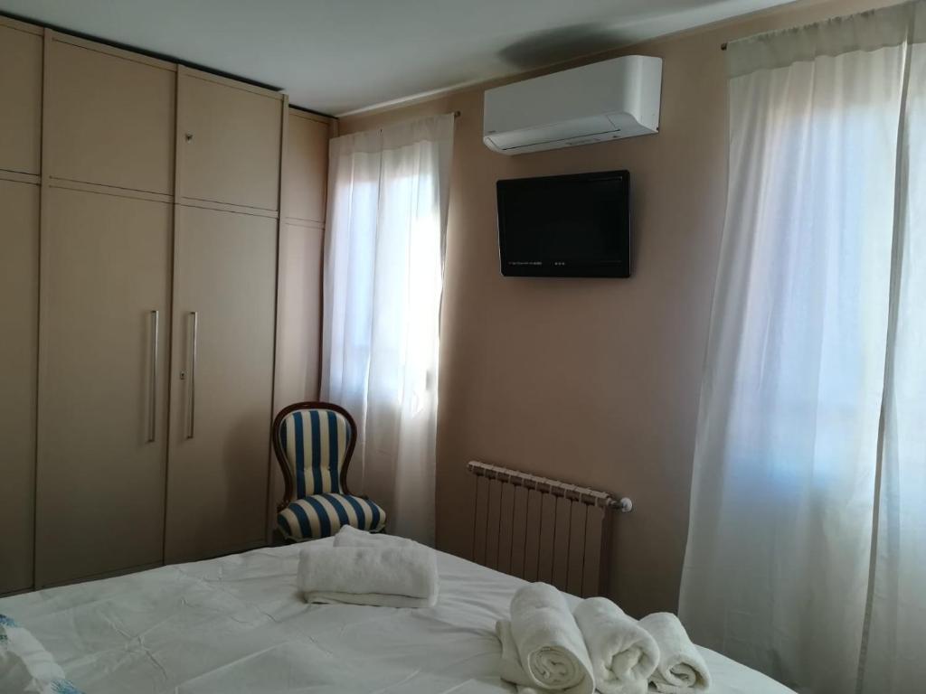 Posteľ alebo postele v izbe v ubytovaní Cavour17