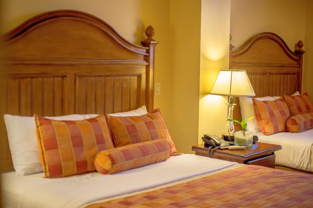 Cama o camas de una habitación en Hotel Monteolivos