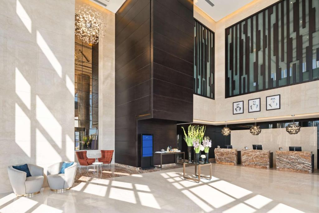 A seating area at Radisson Blu Hotel, Dubai Canal View