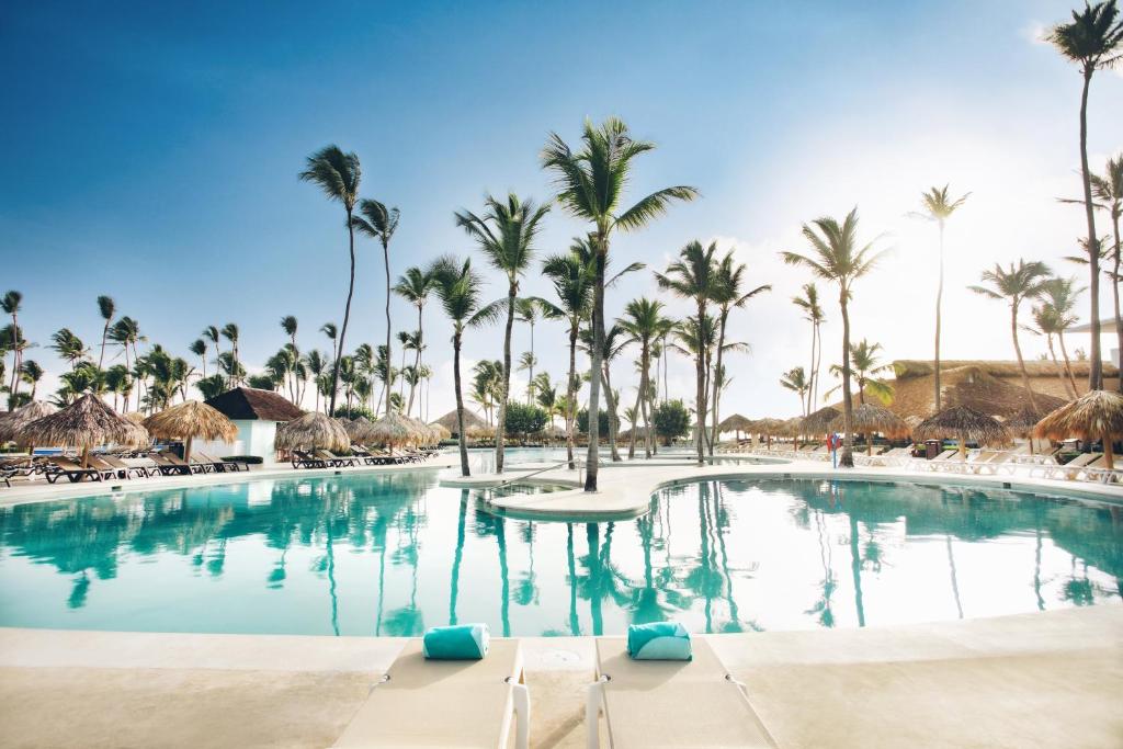a pool at the excellence punta cana resort at Iberostar Dominicana - All Inclusive in Punta Cana