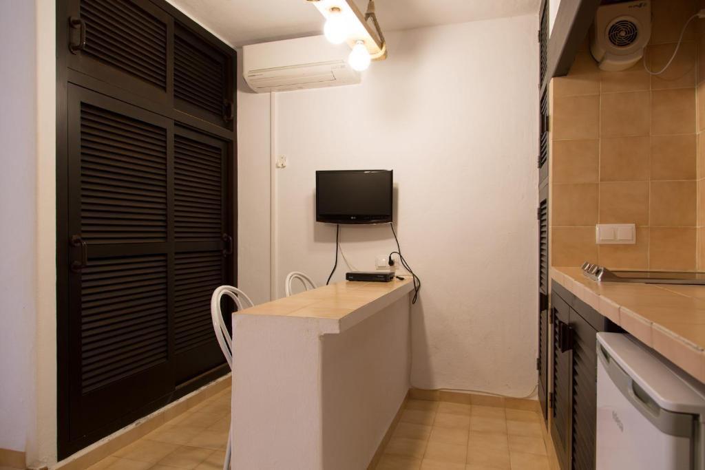 Kuchyň nebo kuchyňský kout v ubytování Apartamentos Noray