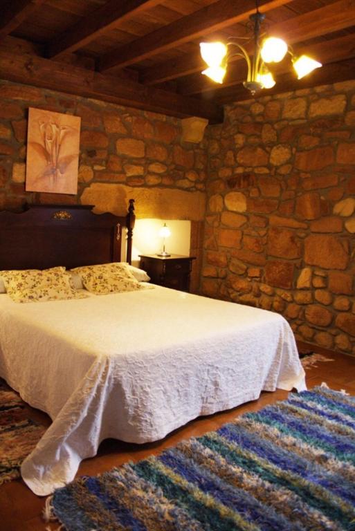 Postel nebo postele na pokoji v ubytování Casa Velarde