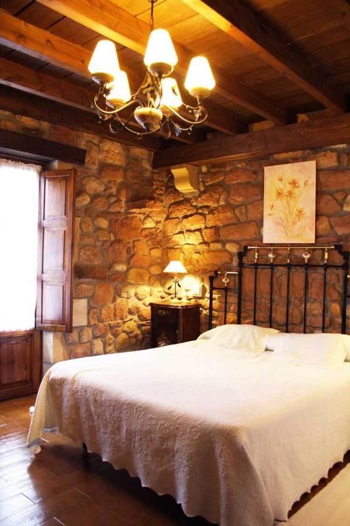 Postel nebo postele na pokoji v ubytování Casa Velarde