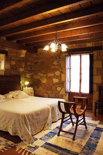 Postel nebo postele na pokoji v ubytování Casa Velarde