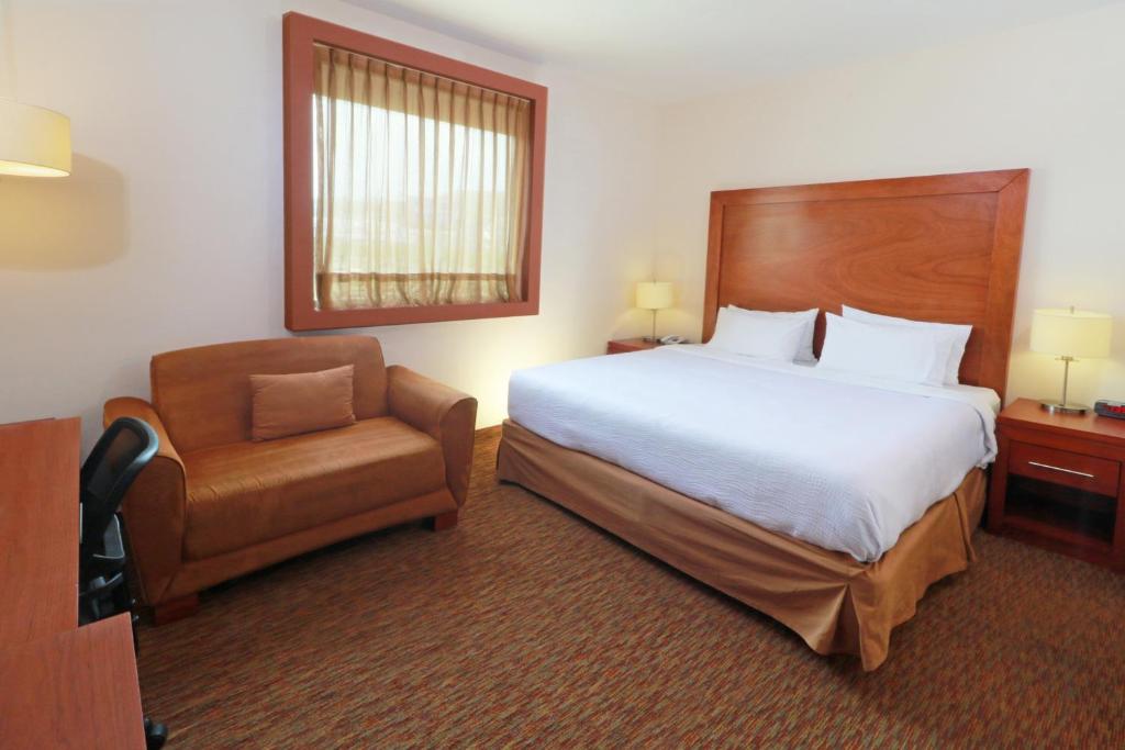 Postel nebo postele na pokoji v ubytování Staybridge Suites Queretaro by IHG
