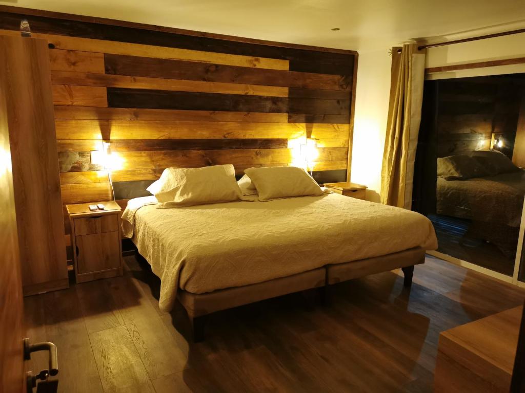 Postel nebo postele na pokoji v ubytování Lodge Nueva Elqui