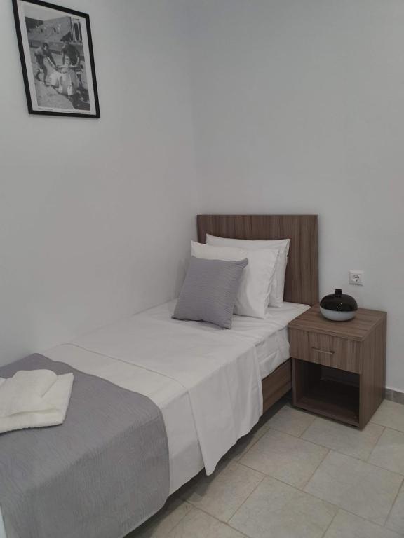 Postel nebo postele na pokoji v ubytování HARA BEACH