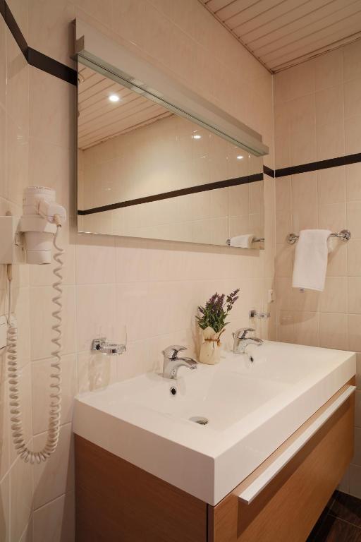 Koupelna v ubytování Hotel Grupello