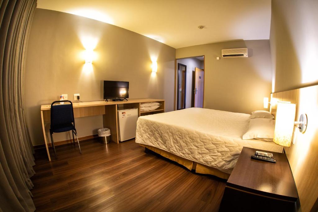 Postel nebo postele na pokoji v ubytování Hotel Campo Largo Express