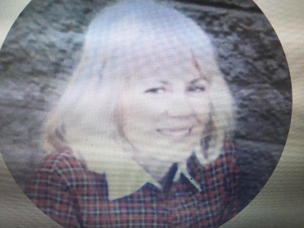 a photograph of a woman in a plaid shirt at Derinda House in Elizabeth