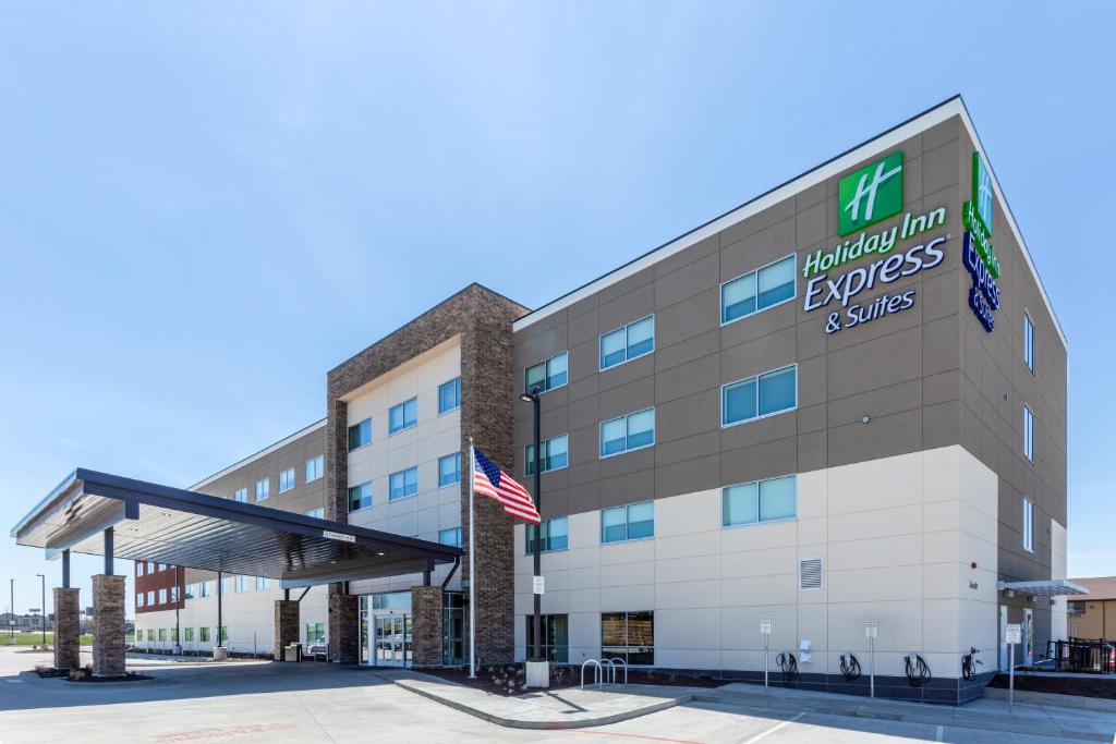 a large building with a sign on top of it at Holiday Inn Express & Suites - Springfield North, an IHG Hotel in Springfield