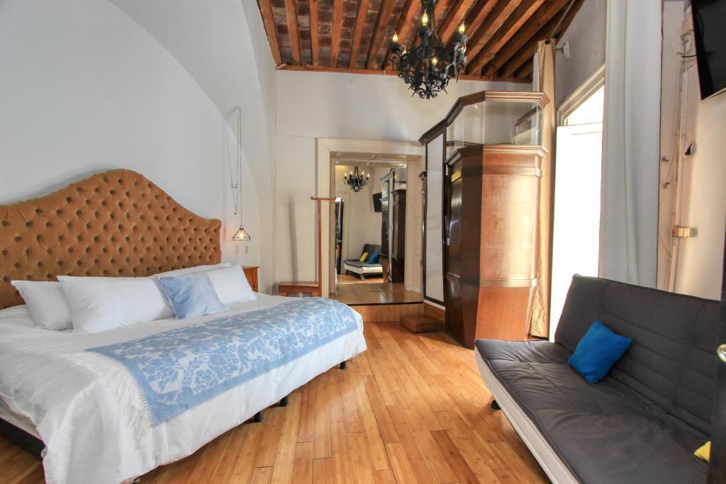 Postel nebo postele na pokoji v ubytování Hotel Mansion Von Humboldt
